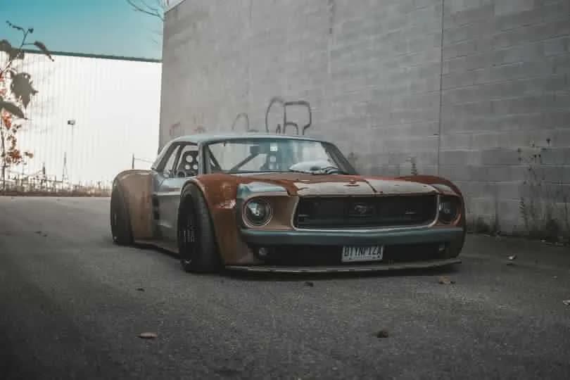 The owner's photo of the Mustang head-on against a concrete wall